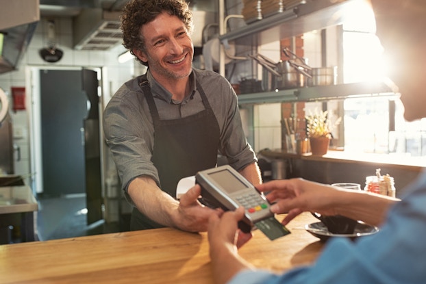 Man paying with credit card
