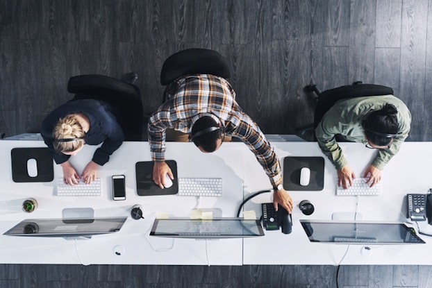 Overhead shot of employees at desk