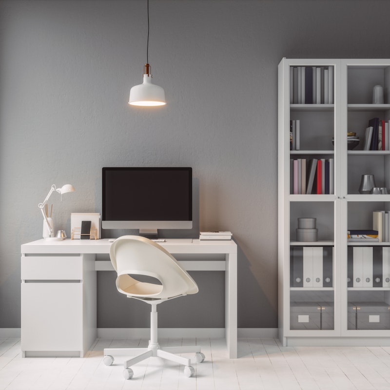  Modern home office with white furniture. 