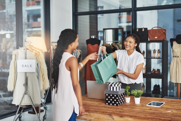  Woman shopping in boutique