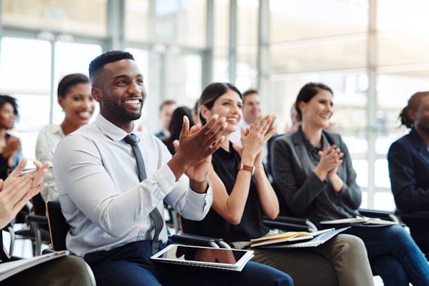  diverse coworkers in a meeting