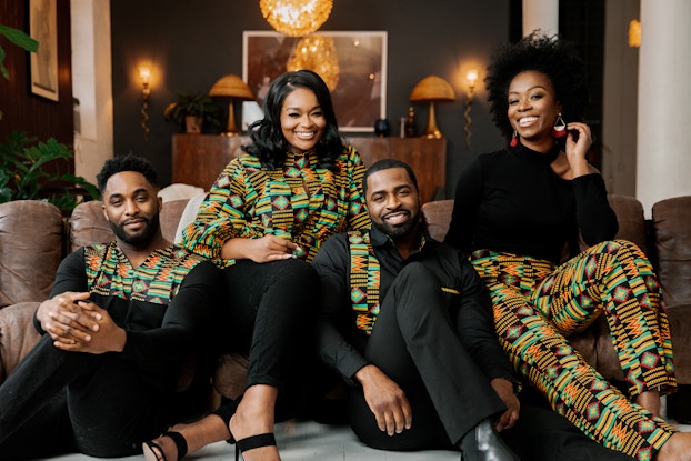 Models wearing clothing created by D'IYANU.