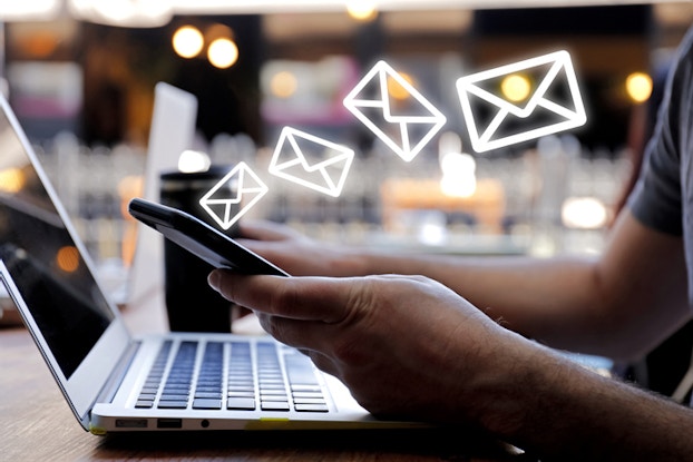 Digital envelopes coming from computer screen