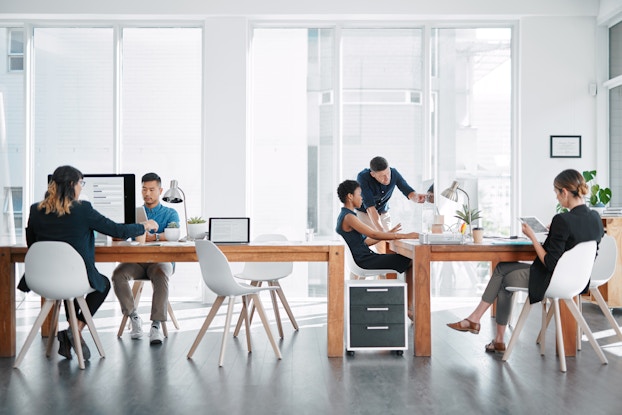 coworkers in a bright office space