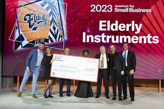 The winners of America's Top Small Business on stage claiming their prize.