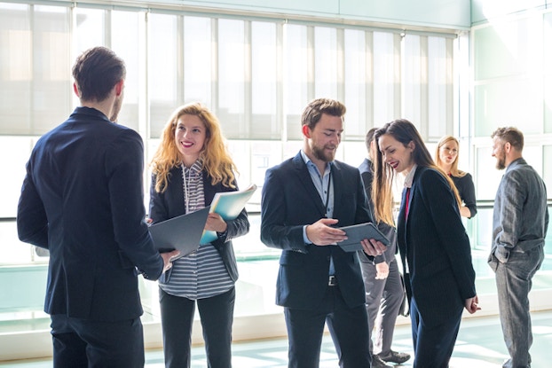 a group of professionals at a networking event