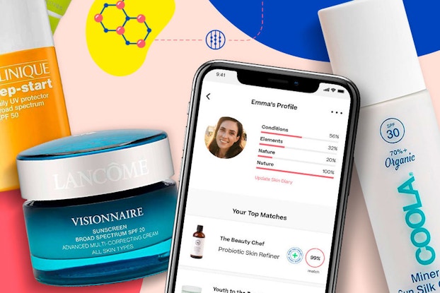 image of good face project's digital tool on a phone screen surrounded by beauty products