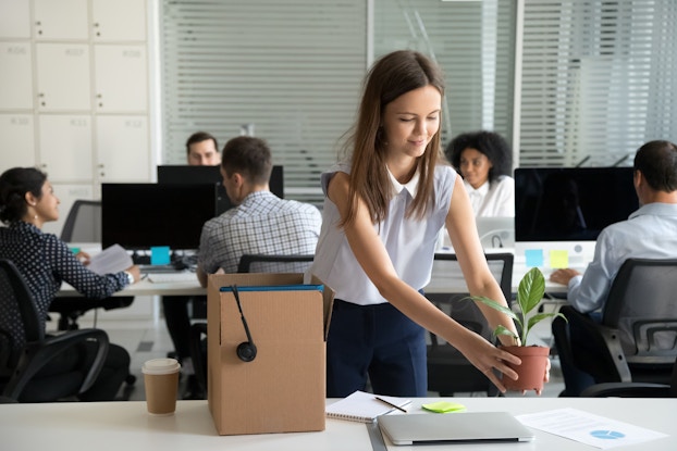 Employee setting up desk