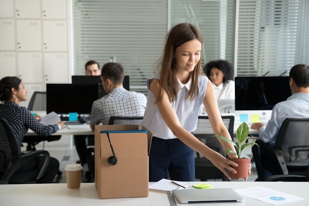  Employee setting up desk