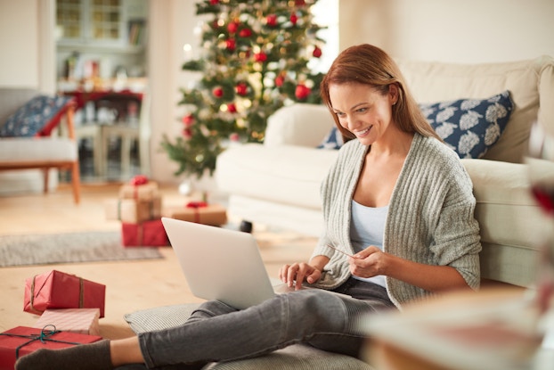  woman doing holiday shopping online