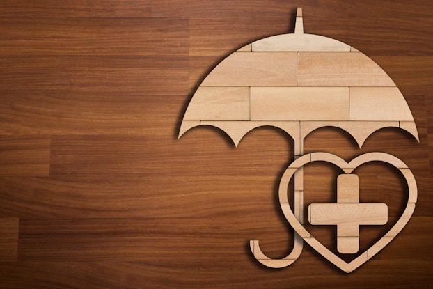 wooden display of icons representing health