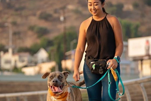Michelle Chu, founder of Kono's Kitchen, with her dog Kono.