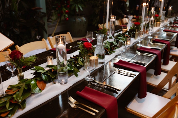  Tablescape with maroon and green colors set up by LUX Catering & Events.