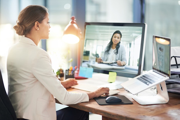  two women having an online meeting