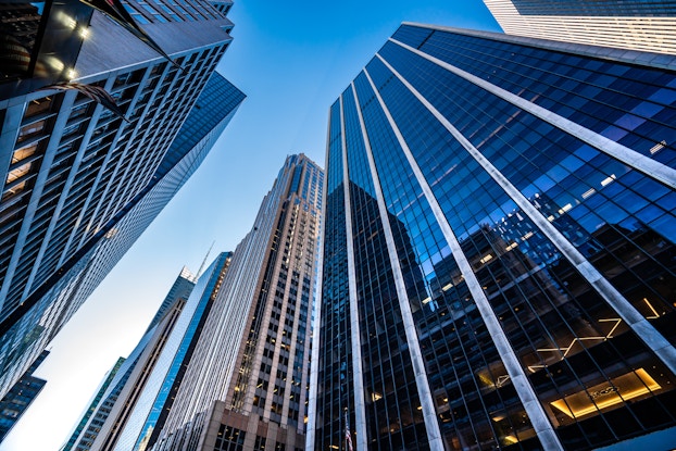 upward-facing image of city buildings