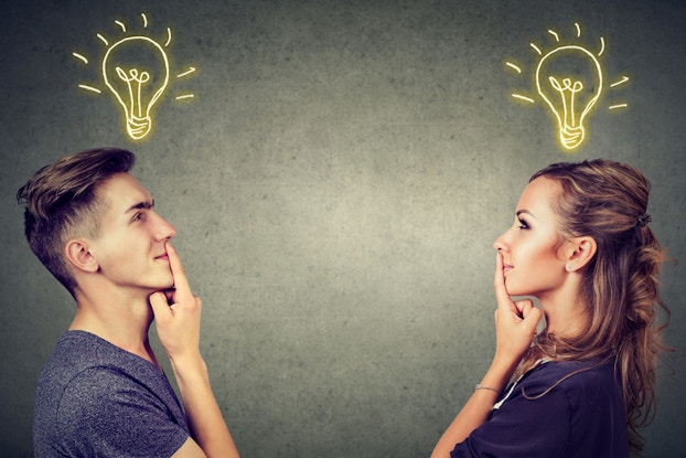  man and woman brainstorming ideas