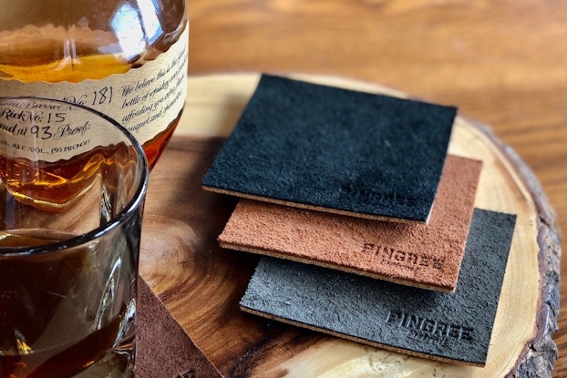 Products by Pingree displayed with whiskey.