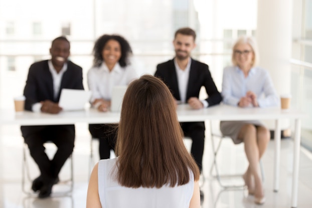  Woman being interviewed for a job.