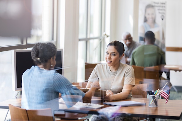 female soldier in business meeting