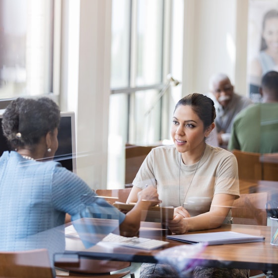 female soldier in business meeting