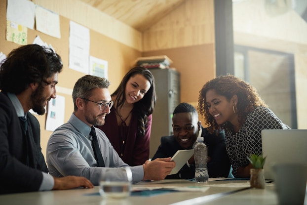  group of coworkers in a meeting