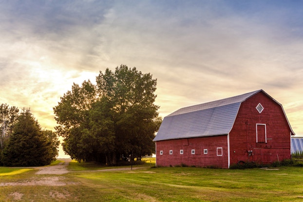 red barn at sunset