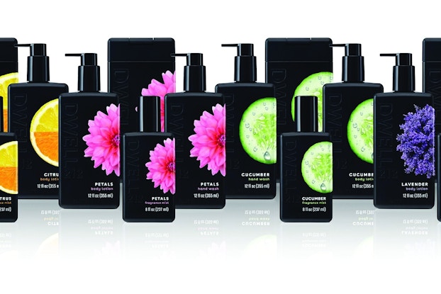 A line of aromatherapy bath and body products from Dwell212, a brand of Slatkin + Co. goods. The containers are tall, rectangular, and black with white text and minimalist close-up pictures of their scent sources. There are four products grouped together for each scent: a body lotion, a fragrance mist, a hand soap, and a body wash. The scents from left to right are citrus, petals, cucumber, and lavender.