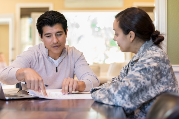 woman soldier in a meeting with a man