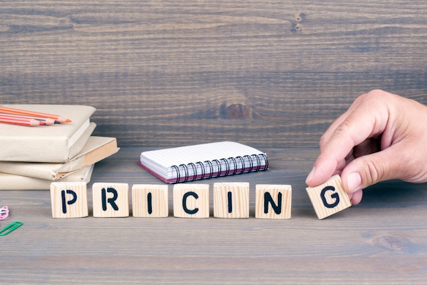 wood blocks spelling out the word pricing