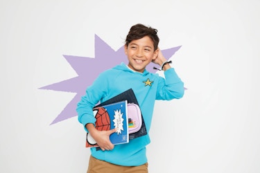  Young boy holding books in a Target back-to-school ad. 