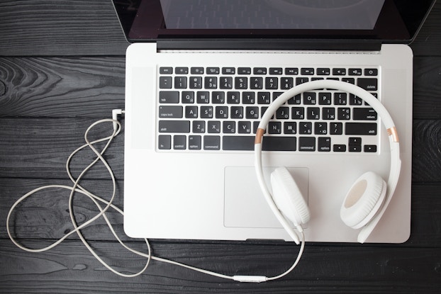 headset with laptop on table