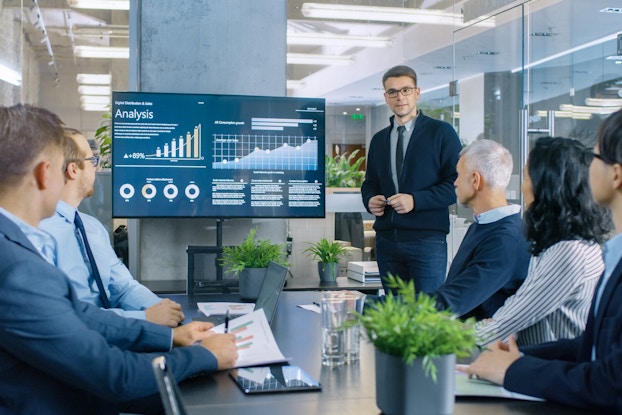 man presenting during a meeting