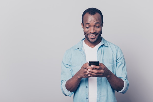  Man browsing on his smartphone.