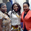 a group of women posing for a photo