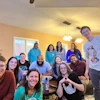 a group of people posing for a photo